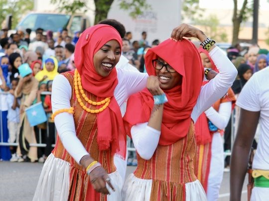 The young men and women of the Somali Museum Dance Troupe study and perform traditional dances from all regions of Somalia. The dancers are high school and college students passionate about sharing their culture. They perform throughout the United States. The "Somalis + Minnesota" exhibit opens June 23, 2018 at the Minnesota History Center. (Photo: Mustafa Ali)